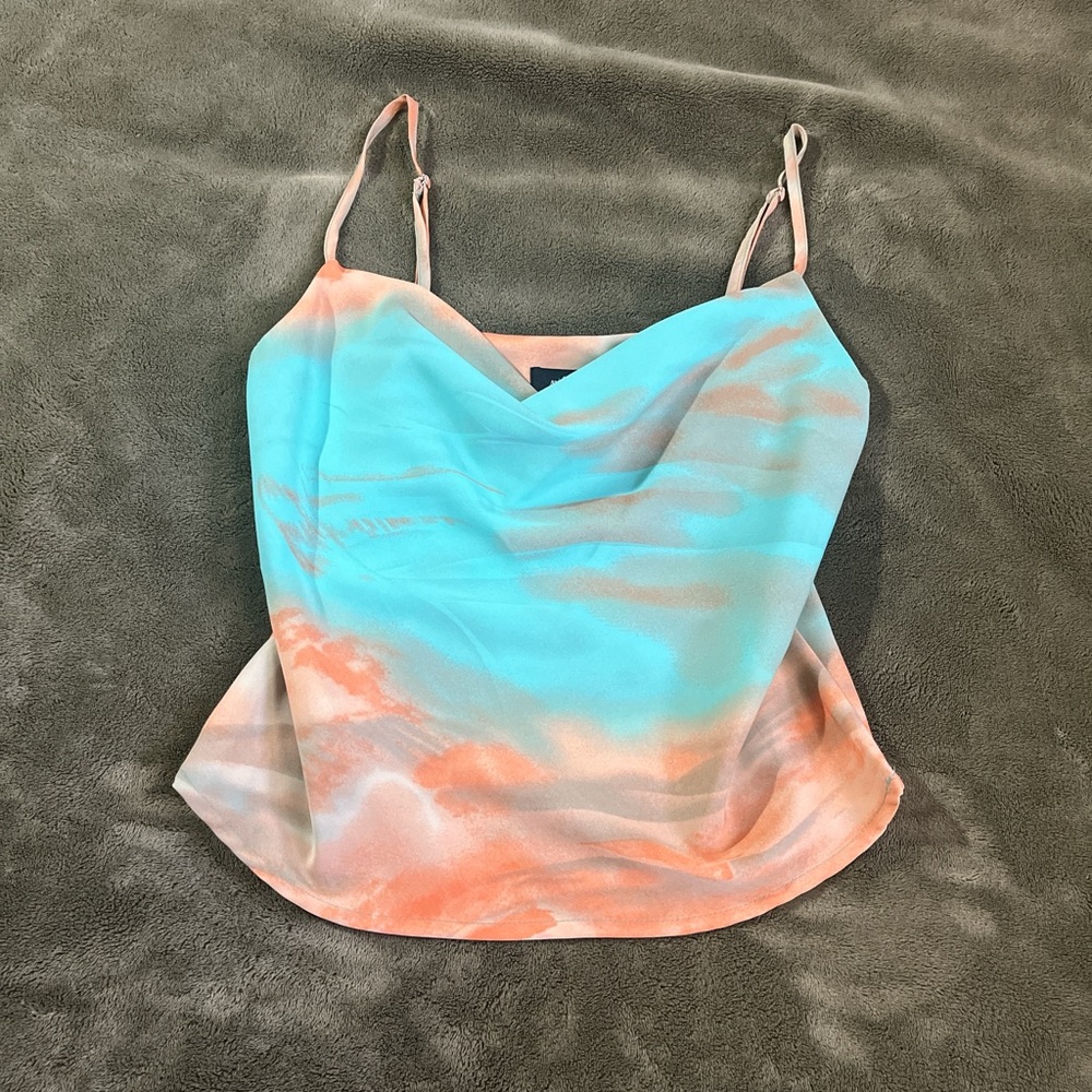 Gorgeous Turquoise and orange tie-dye top with a flowy design